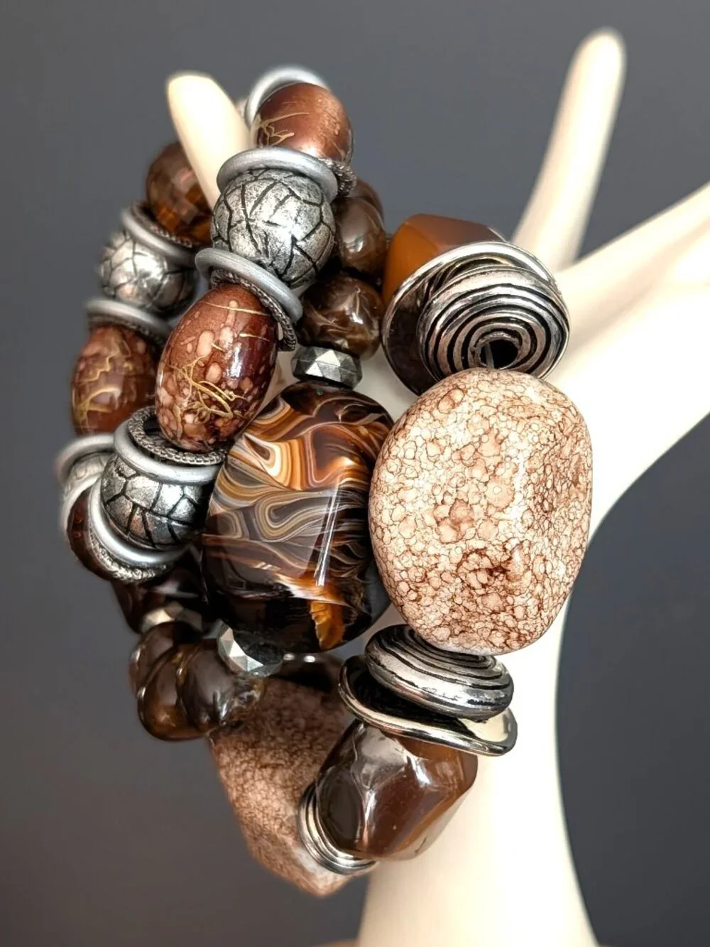 Bundle of chunky shades of brown and silver accents stretch bracelets